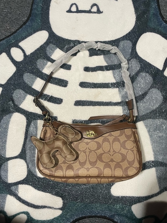 Coach Handbags - Coach Signature Canvas Shoulder Wristlet in Brown and Tan